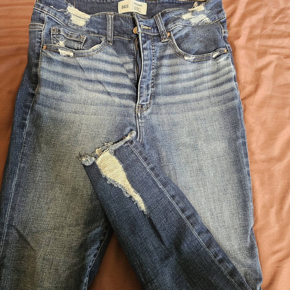 Buckle Women's Distressed Blue Jeans